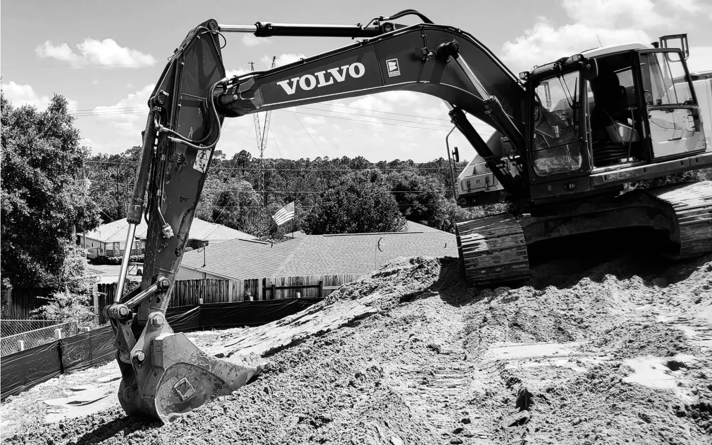backhoe land clearing and flattening baker fl